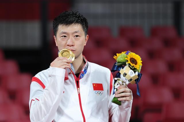 乐鱼集团-马龙的2021：东奥成就乒坛第一人 33岁仍在路上